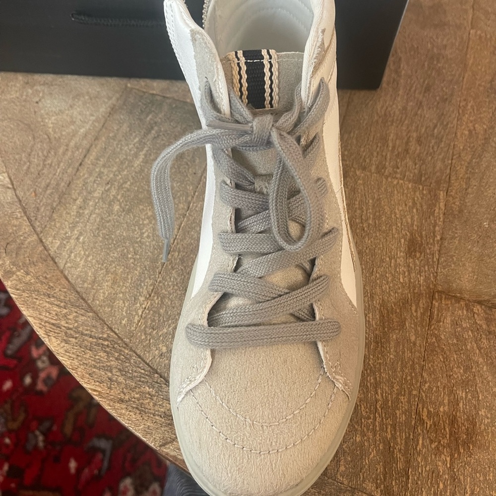 Brand new in box high top sneakers. Girls size 5 / women’s size 7.